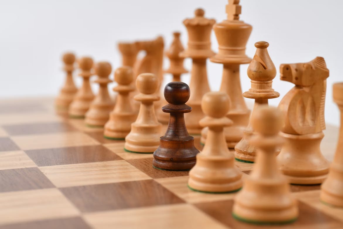 Strategic chess endgame setup on a chess board